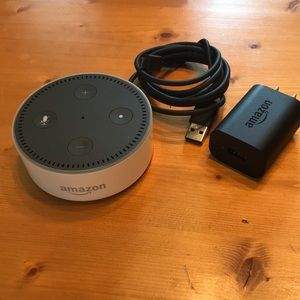 Amazon Echo Dot Alexa enabled Bluetooth smart speaker.